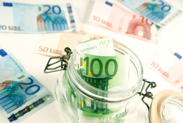 istock Many euro bills and money box 839223532