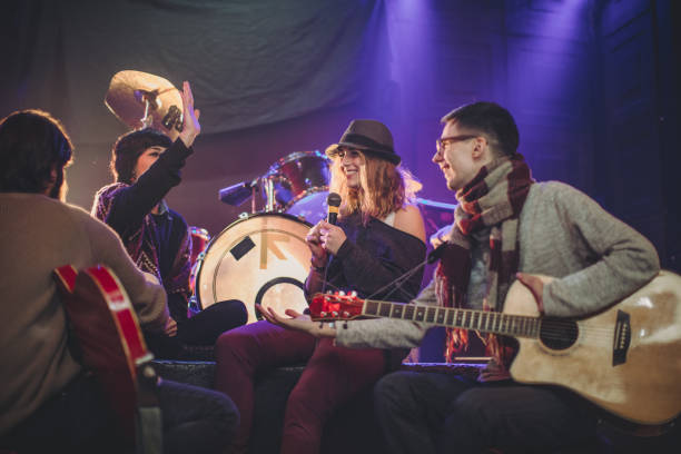 istock Rock band playing in the club 839226538
