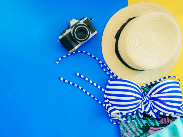 istock vacation and summer cloth accessories concept with blue and yellow background 839241172