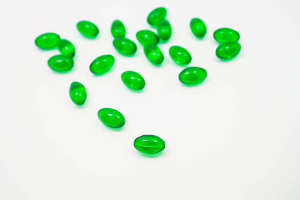 istock green pills soft gel capsule isolated on white background 839242978