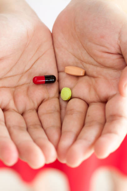istock Pills medicine tablets in doctor hand 839243050