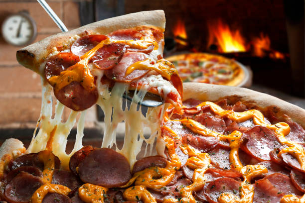 istock Slice of pizza raised 839243412