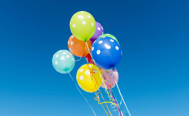 istock Balloons against the blue sky 839256534
