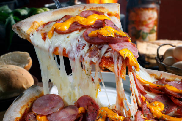 istock Slice of pizza raised 839258798