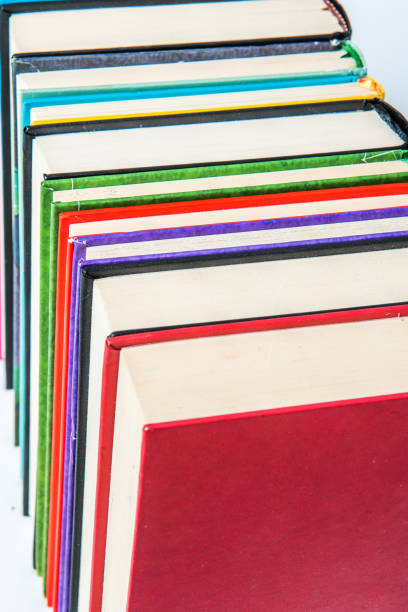 istock Stack of books on a shelf, multicolored book spines. 839259108