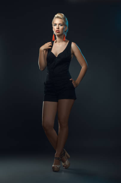 istock fashionable beautiful woman posing in studio 839266614