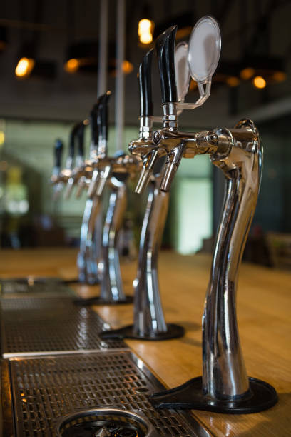 istock Beer taps in row at bar 839277348