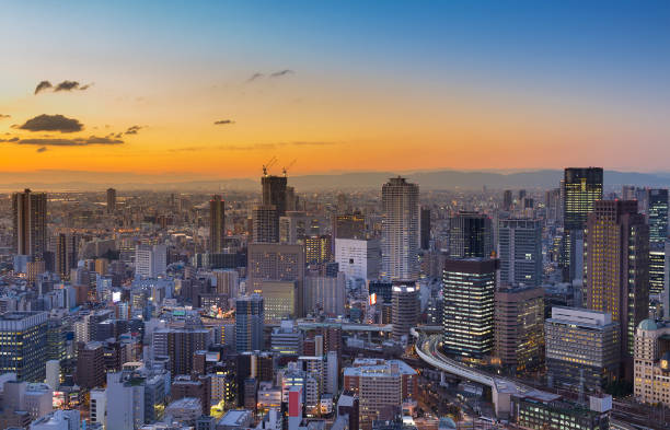 istock City building downtown with sunset sky background 839310198