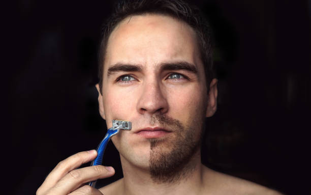 gesundheit, schönheit und hautpflege-konzept - human face men bizarre stubble stock-fotos und bilder