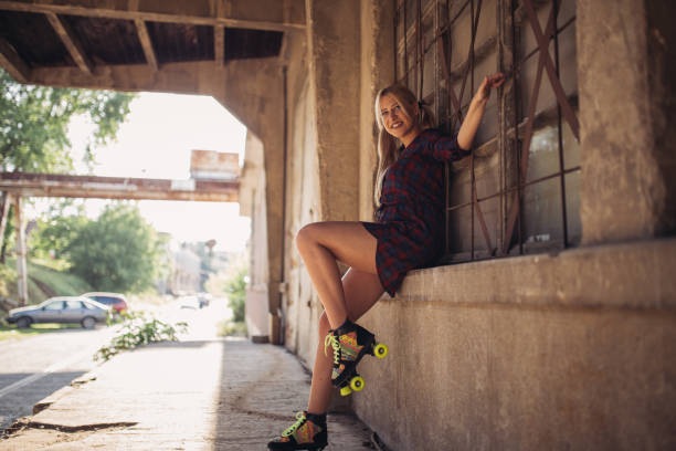 istock Blond woman on roller skates 839325930