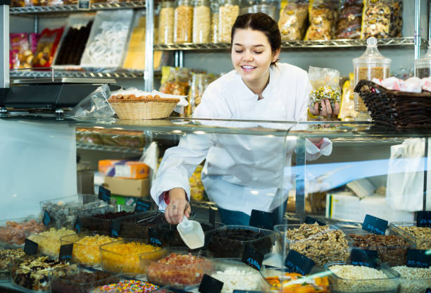 istock Girl selling candied fruit 839331794