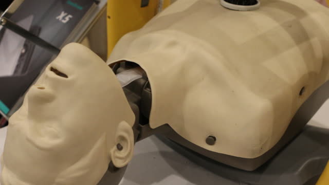 Automated External Defibrillator With Training Dummy