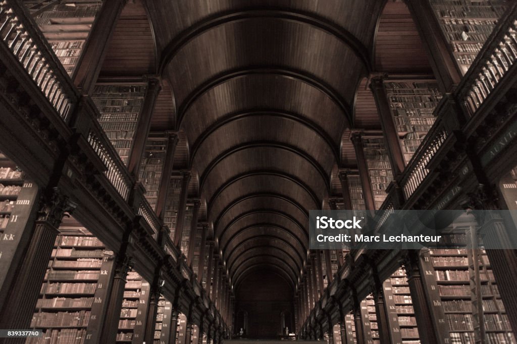 Dublin Ireland January 23 2017: Old library on Trinity college ceiling landscape Dublin Ireland January 23 2017: The Old Library building at Trinity College in Dublin includes the Book of Kells exhibit and the landmark Long Room. Star Wars used it as a model for the Jedi Library. This picture shows the arches and ceiling. Library Stock Photo