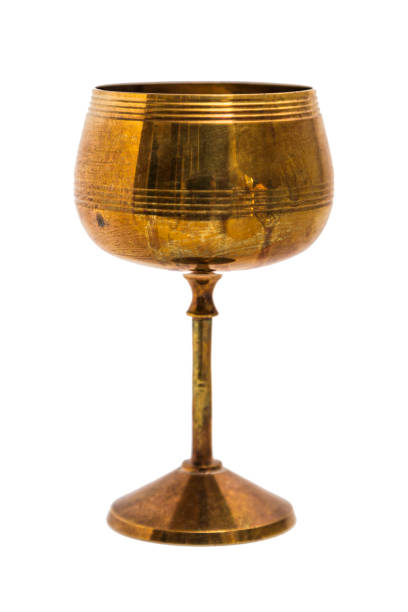 istock Antic gold engraved oriental metal vase on isolated background. 839342858