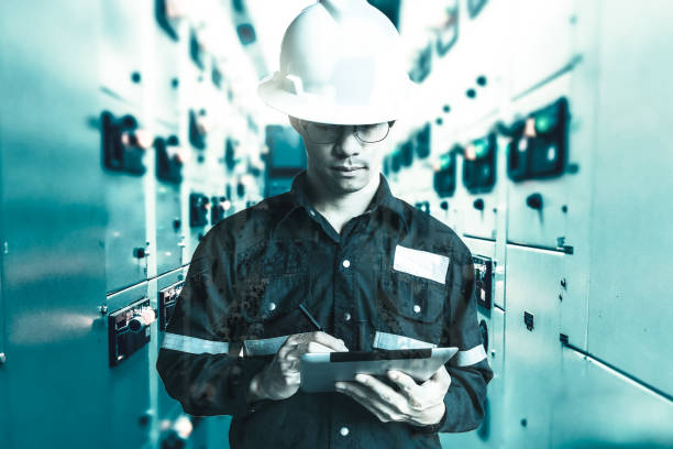 istock Double exposure of  Engineer or Technician man working with tablet in switch gear electrical room of oil and gas platform or plant industrial for monitor process, business and industry concept. 839354522
