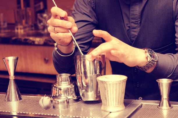 istock Bartender is mixing ingredients in shaker, toned 839363814