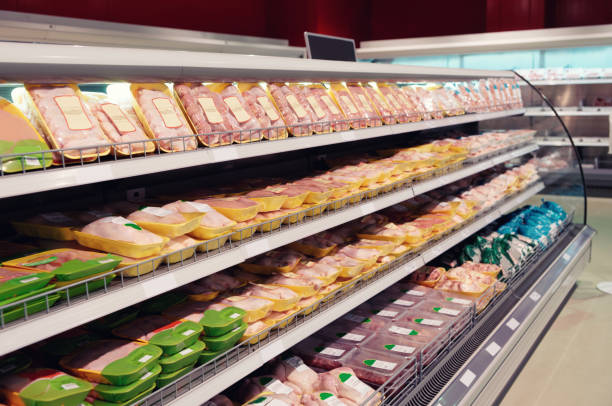istock Fresh chicken meat on supermarket shelf, toned 839365532