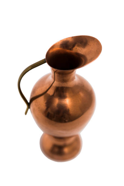 istock Antic gold engraved oriental metal vase on isolated background. 839371964