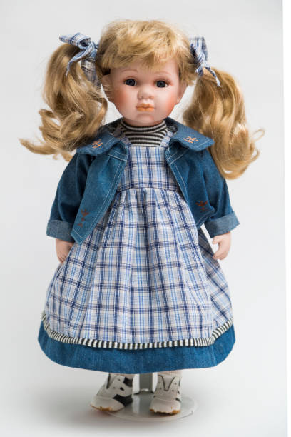 istock Ceramic porcelain handmade doll with long blond hair with tail 839372130