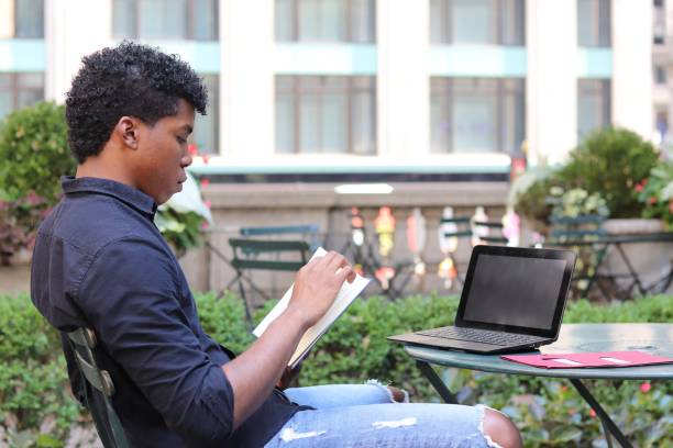 istock Handsome man working. Mobile office, outside park. business man, student working concept 839380216