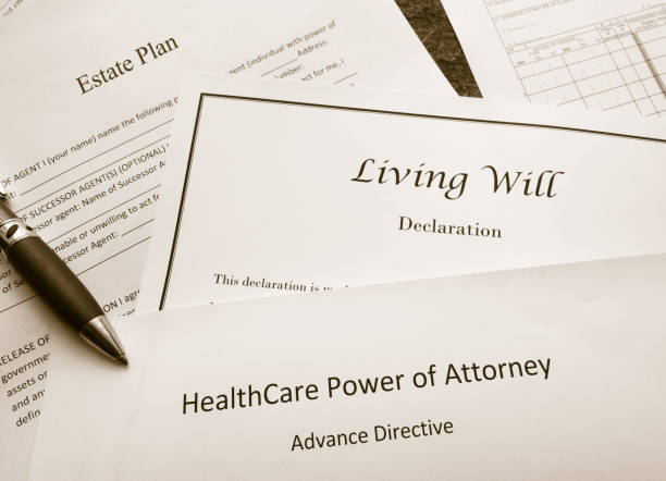 Legal and estate planning documents Estate Plan, Living Will, and Healthcare Power of Attorney documents legal document stock pictures, royalty-free photos & images