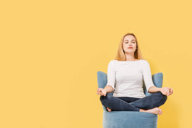 istock Young woman relaxing on chair. Picture includes copy space 839380670