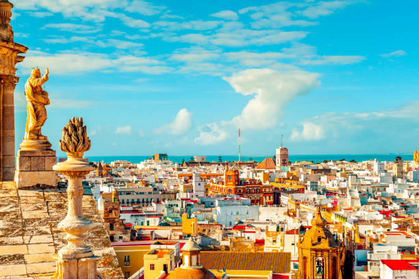 aerial view of Cadiz, Spain an aerial view of the roofs of Cadiz, Spain, from the belfry of its Cathedral cádiz stock pictures, royalty-free photos & images