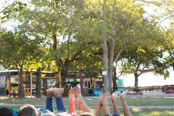 istock Children relaxing at park 839384550
