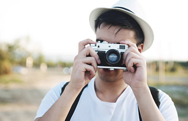 istock Young man photographer close up portrait 839384632