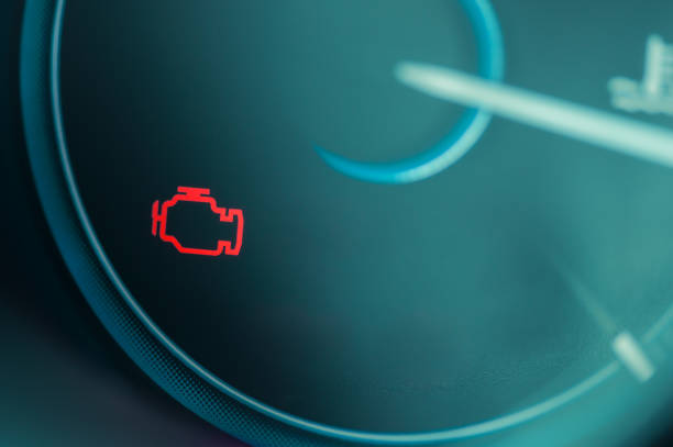 Check engine light on dashboard of modern car Check engine light on dashboard of modern car dashboard vehicle part photos stock pictures, royalty-free photos & images