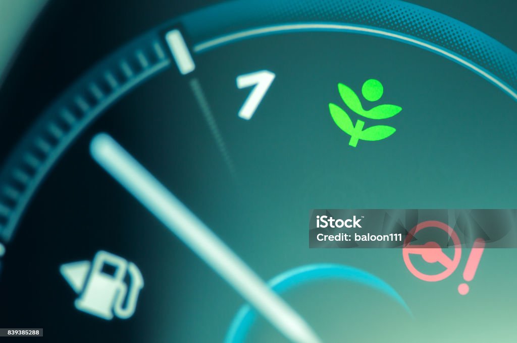 Eco drive light icon on car dashboard. Eco drive light icon on car dashboard. Eco-driving concept Biofuel Stock Photo