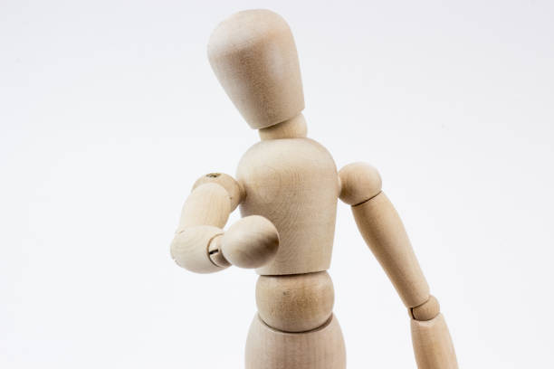 istock A wooden mannequin pointing at us. 839385334