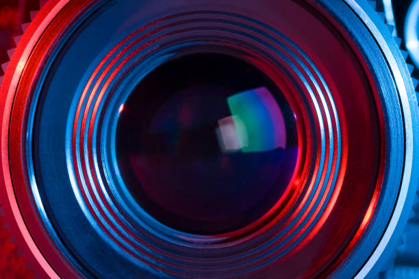 istock Closeup of retro camera lens with red and blue lighting 839388780