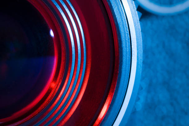 istock Closeup of retro camera lens with red and blue lighting 839388832