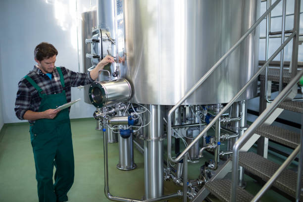 istock Male worker examining storage tank 839392144