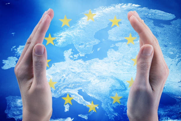 European map with flag and two hands showing togetherness