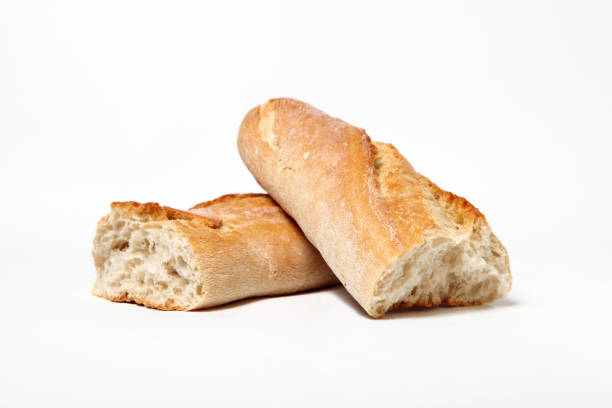 baguette francese isolata - bread bun broken isolated foto e immagini stock