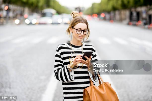 Business Woman With Phone On The Street Stock Photo - Download Image Now - Women, Striped, City