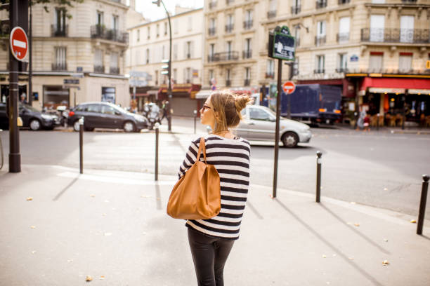 istock Woman walking in Paris 839416386