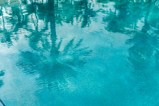 Fresh swimming pool stairs in a sunny morning