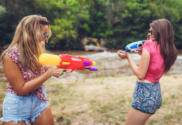 istock Girls playing with water 839441772
