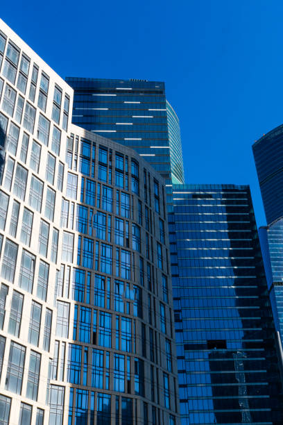 istock Modern skyscrapers from their base with a clean sky in the base 839464302