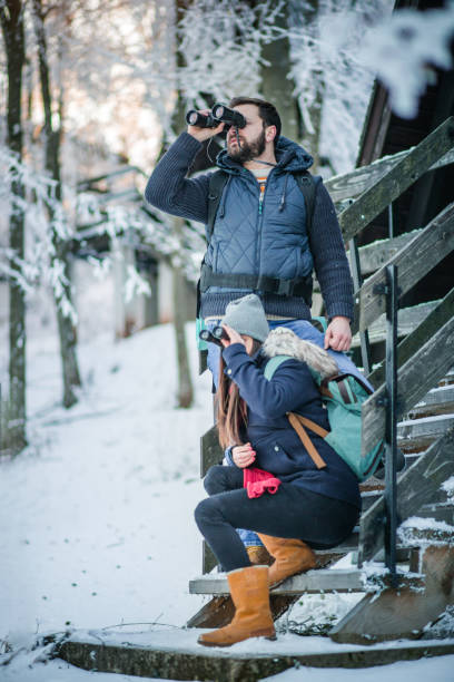 istock Hikers in the mountain cabin house 839474854