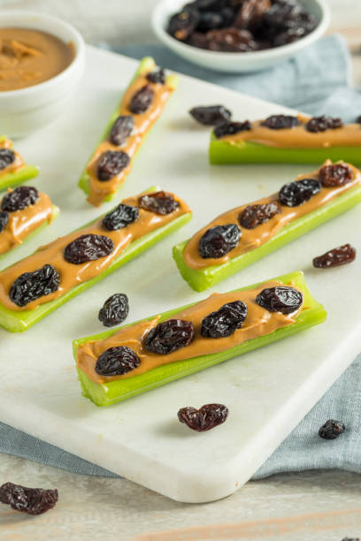 istock Homemade Ants on a Log Snack 839506060