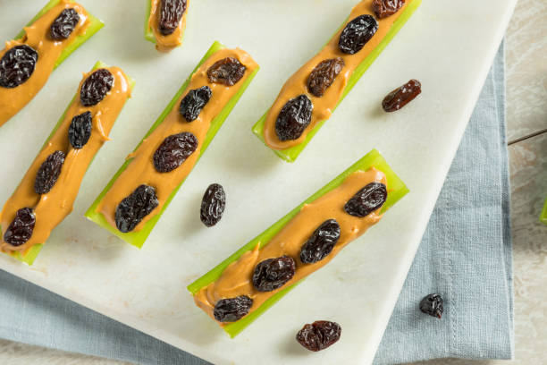 istock Homemade Ants on a Log Snack 839515844