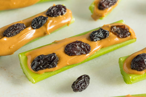 istock Homemade Ants on a Log Snack 839528216