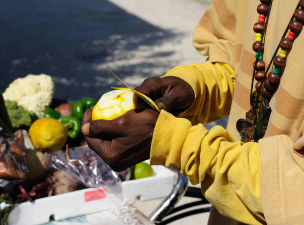 Man storing apples in a bag