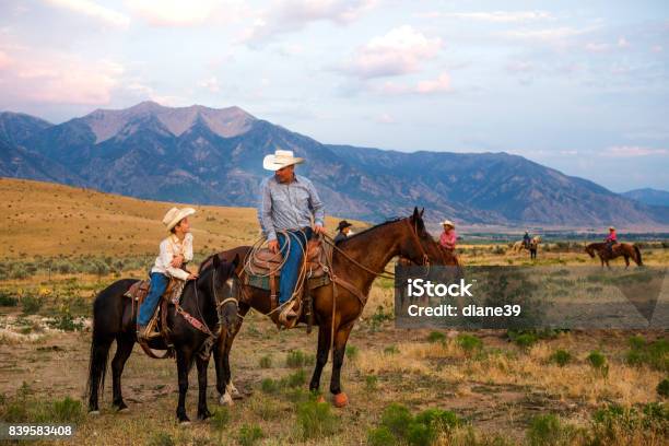 Father And Son Ranchers Stock Photo - Download Image Now - Horseback Riding, Ranch, Cowboy