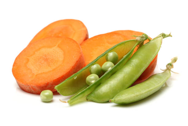 Carrots and peas pod  on the white background