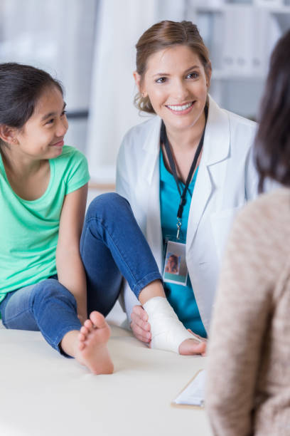 istock Girl with sprained ankle visits the emergency room. 839647352